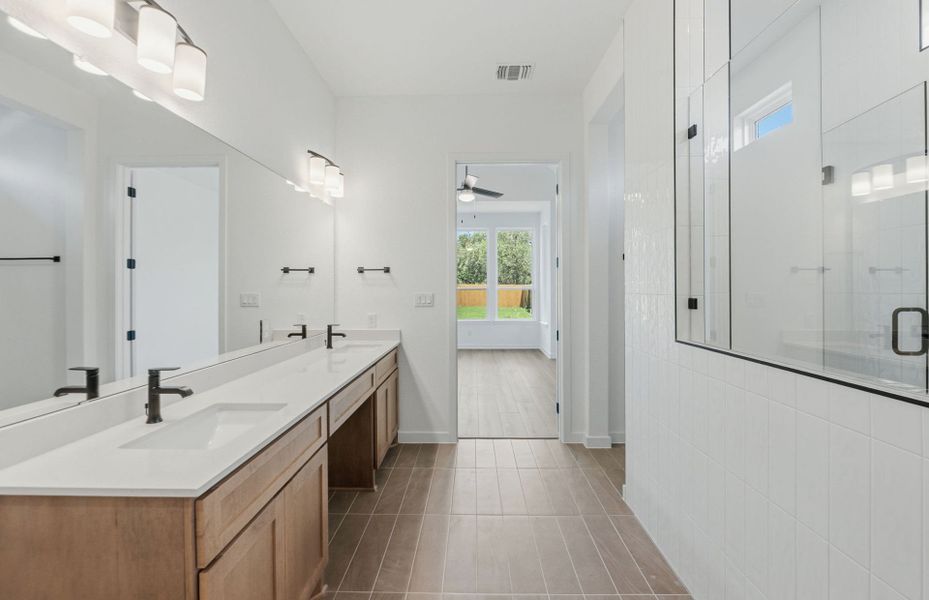 Furnished interior view inside a new home in 6 Creeks, Kyle (Image 6).