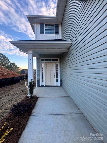 Exterior details and patio area of a home in Village at Parkside, Gastonia (Image 3).