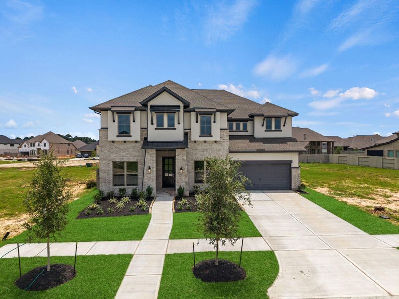 Front exterior of a new home in Pomona, Manvel, TX, highlighting curb appeal (Image 21).