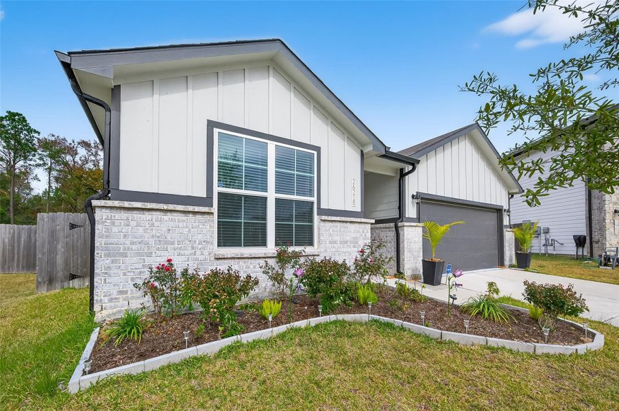 Front exterior of a new home in , Tomball, TX, highlighting curb appeal (Image 28).