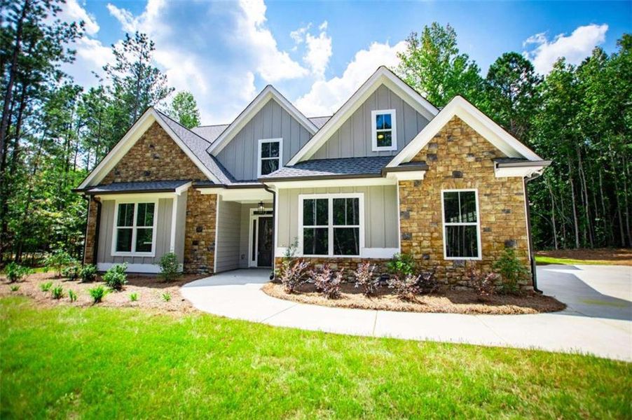 Front exterior of a new home in , Douglasville, GA, highlighting curb appeal (Image 24).