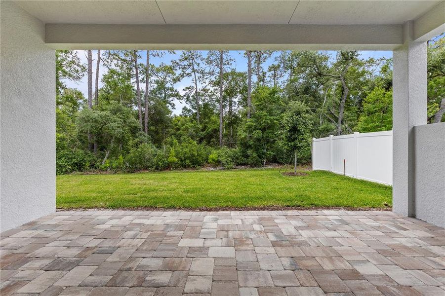 Exterior details and patio area of a home in The Reserve at Victoria, Deland (Image 25).