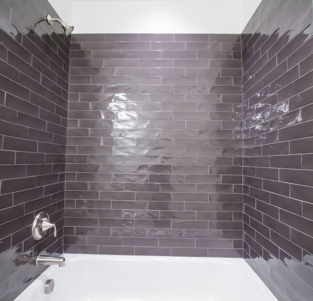 Representative furnished interior of a home built from the The Amherst by RobuckHomes in Windwater, Hampstead (Image 39).