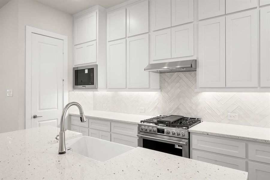 Furnished interior view inside a new home in The Abbey at Mercer Crossing, Farmers Branch (Image 8).