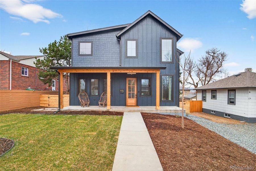 Front exterior of a new home in , Denver, CO, highlighting curb appeal (Image 22).