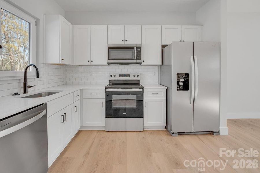Furnished interior view inside a new home in , Statesville (Image 8).