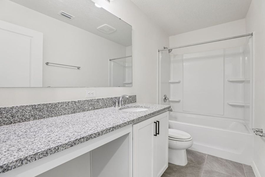 Furnished interior view inside a new home in Reserve at Forest Lake Townhomes, Lake Wales (Image 9).