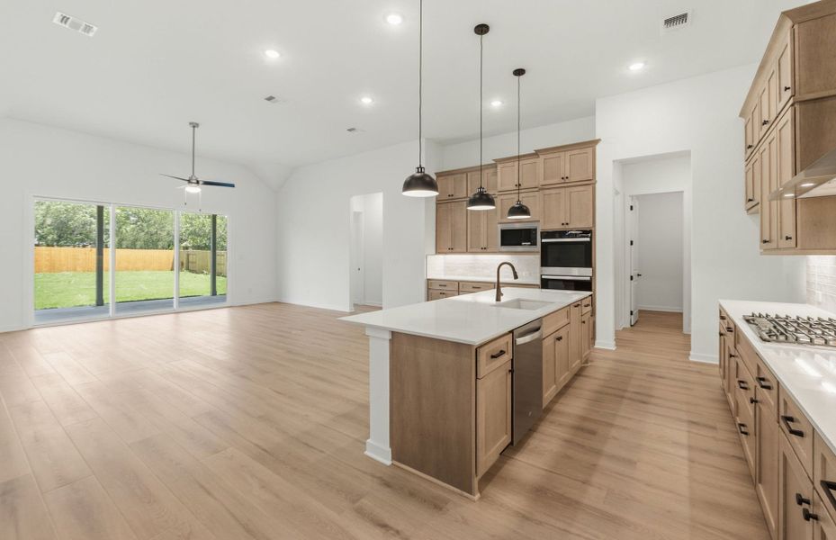 Furnished interior view inside a new home in 6 Creeks, Kyle (Image 7).