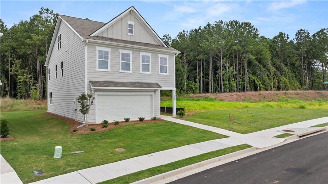 Front exterior of a new home in Walden Park – The Retreat, Jonesboro, GA, highlighting curb appeal (Image 23).