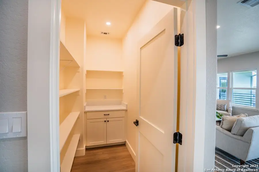 Furnished interior view inside a new home in , Kerrville (Image 14).