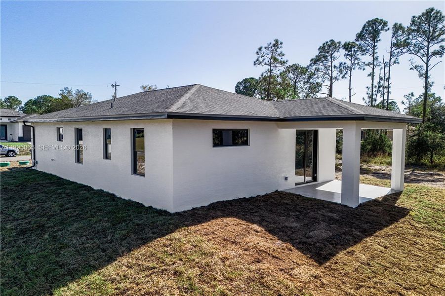 Exterior details and patio area of a home in , Lehigh Acres (Image 3). Exterior details and patio area of a home in , Lehigh Acres (Image 3).