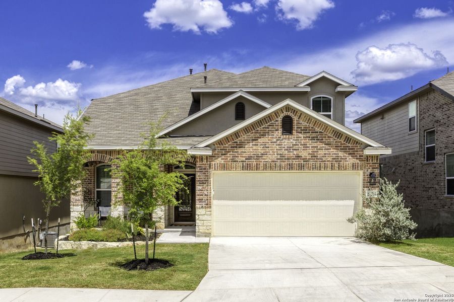 Front exterior of a new home in Canyon View, San Antonio, TX, highlighting curb appeal (Image 25). Front exterior of a new home in Canyon View, San Antonio, TX, highlighting curb appeal (Image 25).