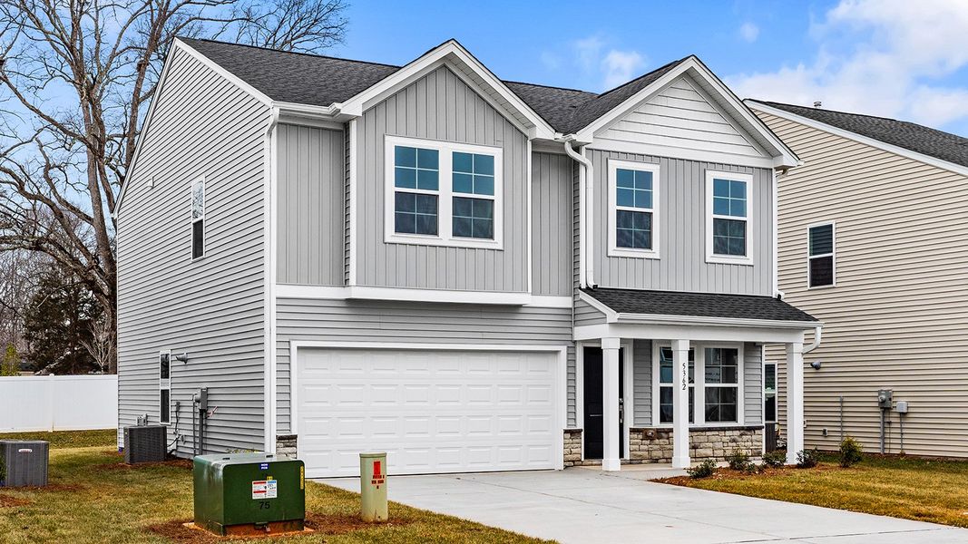 Front exterior of a new home in Hanes Lake, Winston-Salem, NC, highlighting curb appeal (Image 20).