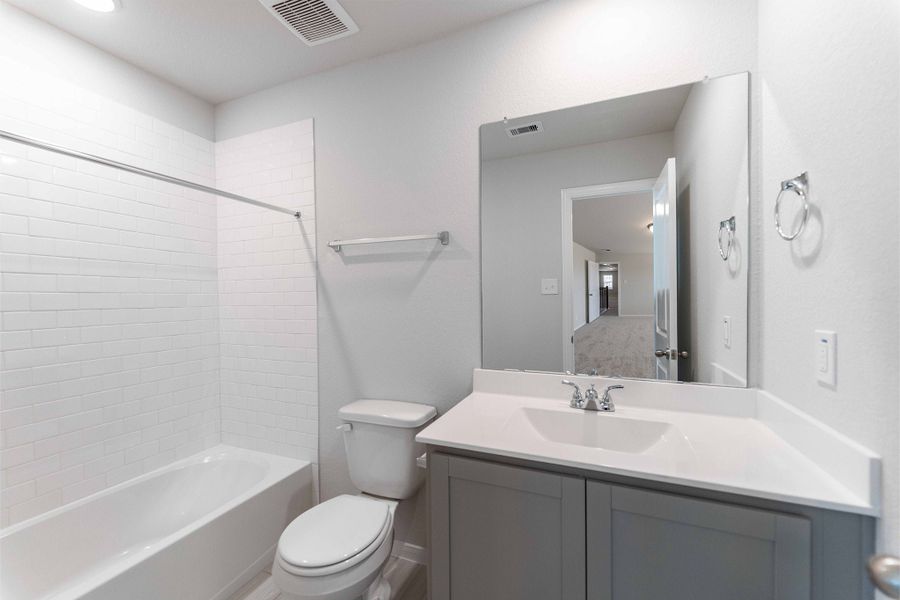 Furnished interior view inside a new home in Harvest Pointe, Needville (Image 9).