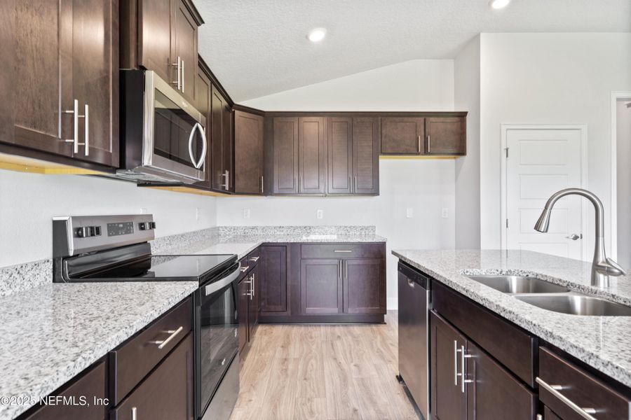 Furnished interior view inside a new home in Shadow Crest at Rolling Hills, Green Cove Springs (Image 4).