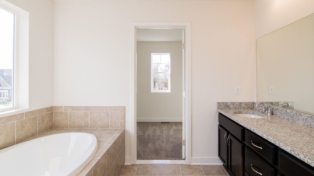 Representative furnished interior of a home built from the The Hartland by Norfolk Homes in Coronado Estates, Jackson (Image 41).