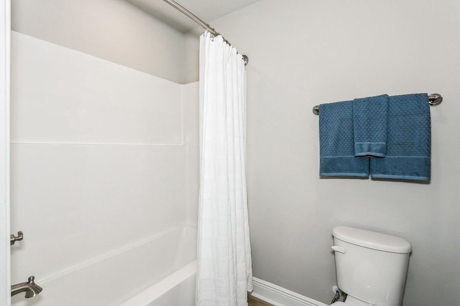 Furnished interior view inside a new home in Walther Reserve, Milton (Image 35).