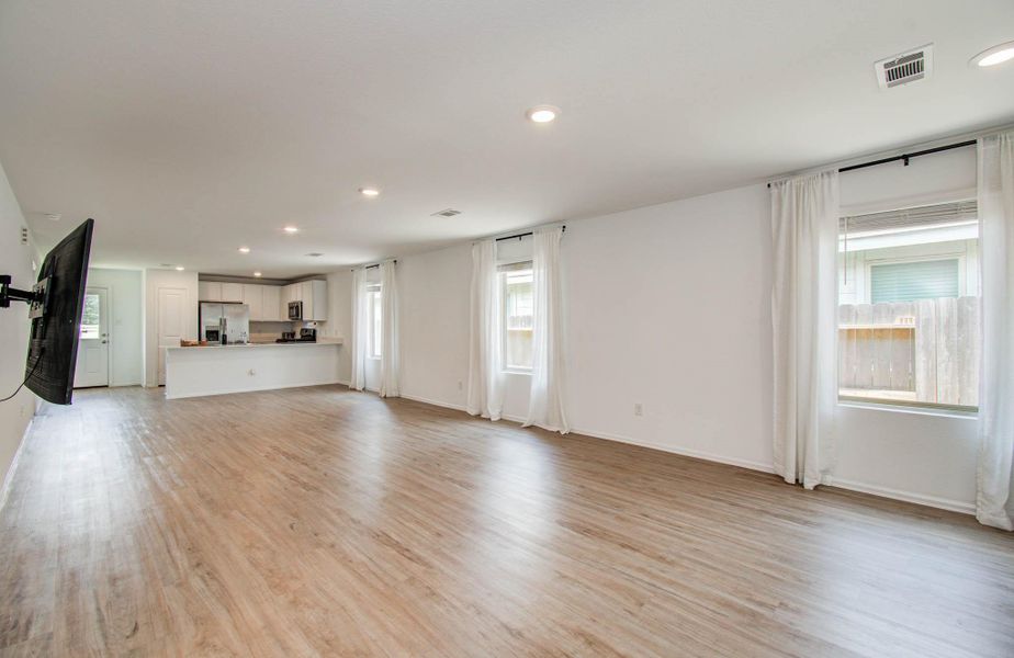 Spacious, unfurnished interior of a new home in Tavola: Cottage Collection, New Caney (Image 33).