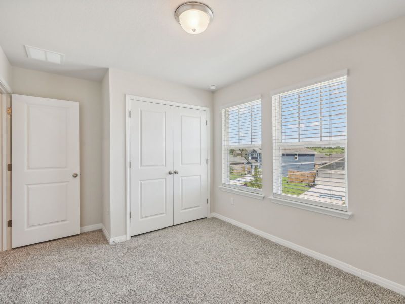 Spacious, unfurnished interior of a new home in Turner's Crossing - Americana Collection, Buda (Image 10).