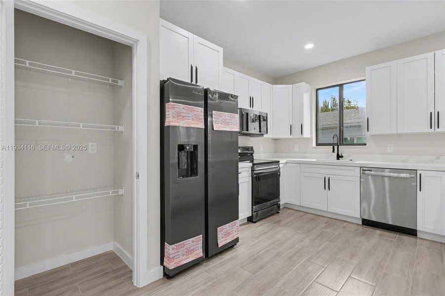 Furnished interior view inside a new home in , Dania Beach (Image 7). Furnished interior view inside a new home in , Dania Beach (Image 7).