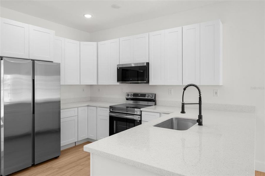 Furnished interior view inside a new home in , Okeechobee (Image 13).