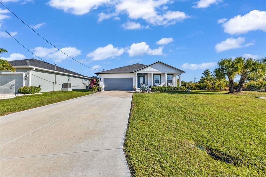 Front exterior of a new home in , Rotonda West, FL, highlighting curb appeal (Image 23). Front exterior of a new home in , Rotonda West, FL, highlighting curb appeal (Image 23).