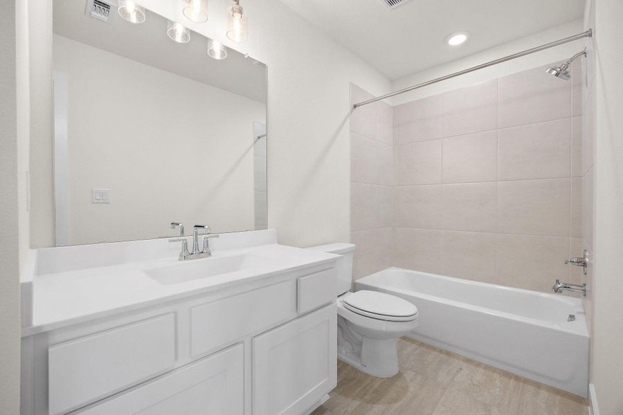 Furnished interior view inside a new home in Bridgeland, Cypress (Image 13).