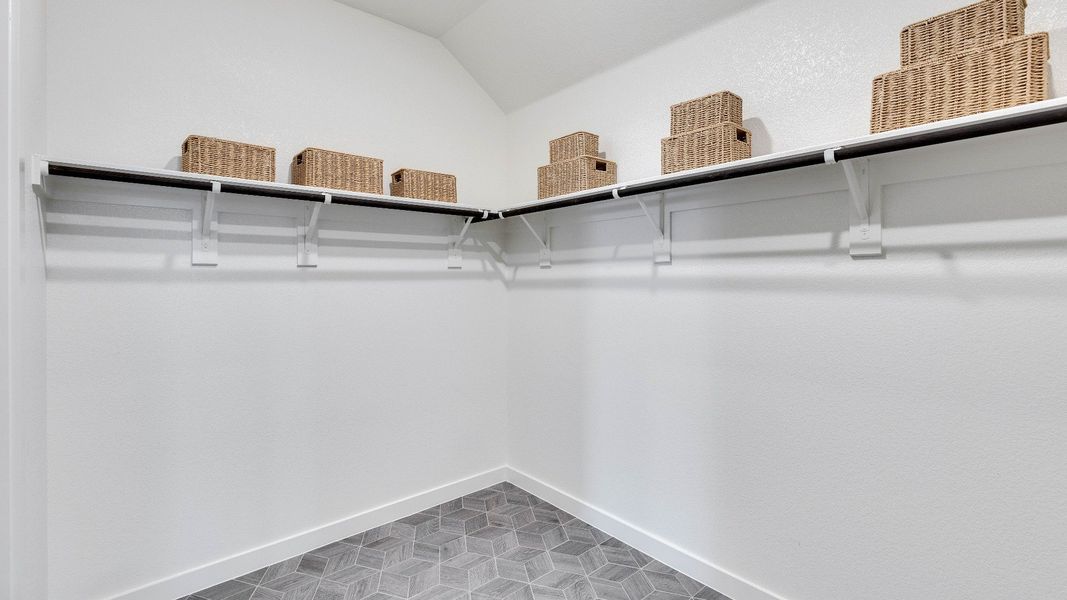 Representative furnished interior of a home built from the Meyerson by DRB Homes in Infinity Square, Kyle (Image 28).