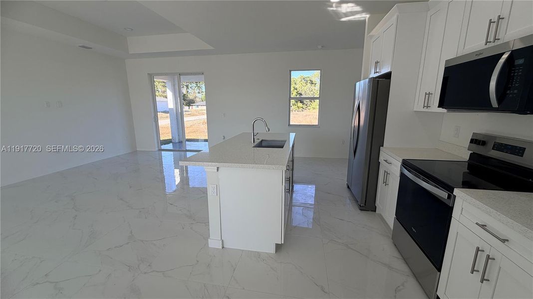 Furnished interior view inside a new home in , Lehigh Acres (Image 9).