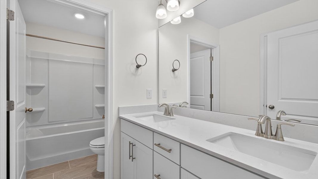 Representative furnished interior of a home built from the Hampshire by D.R. Horton in Kalas Falls, Wake Forest (Image 10).
