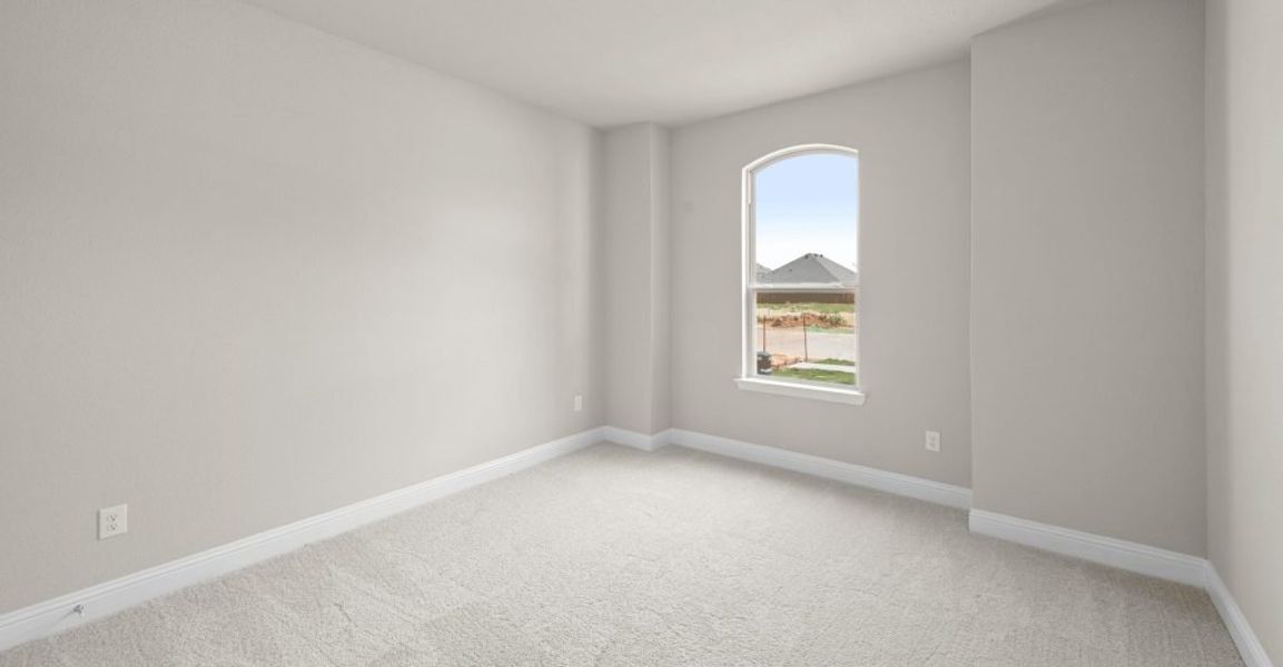 Representative exterior photo of a completed home built from the Donnington by Impression Homes in Still Water Lake, Godley, TX (Image 21).