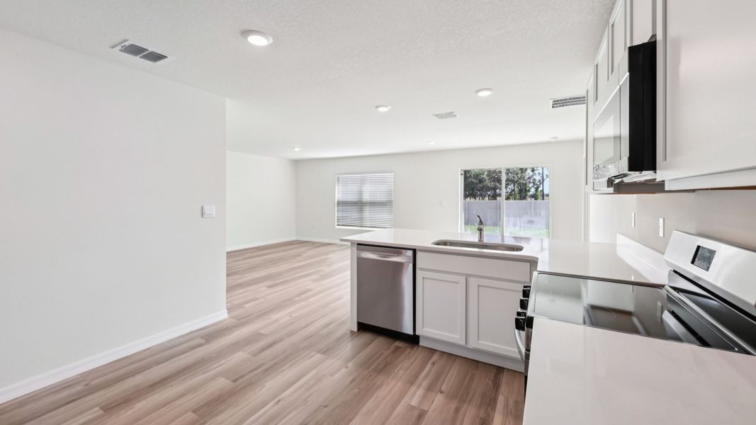 Representative furnished interior of a home built from the DAKOTA by D.R. Horton in Marion County Spot Lots, Ocala (Image 14).