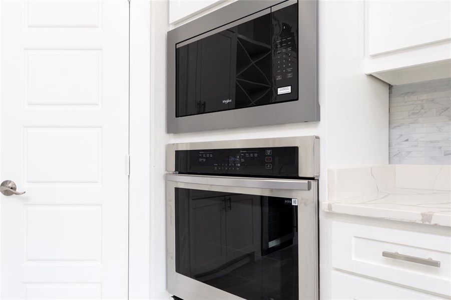 Kitchen view of Oven and Microwave