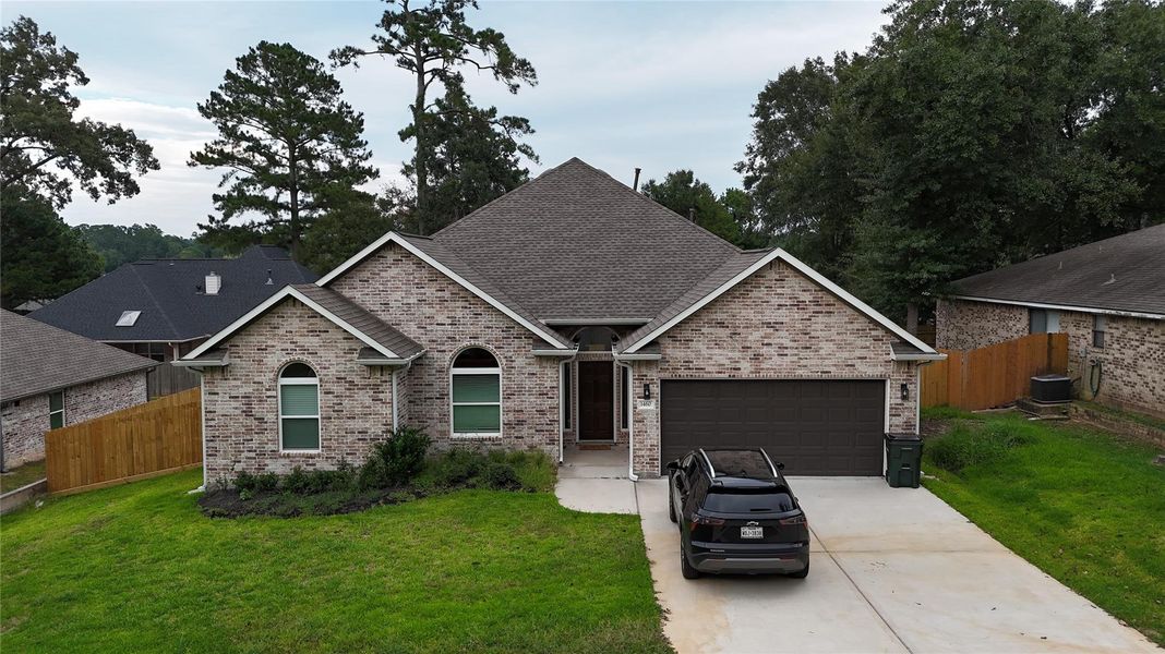 Front exterior of a new home in , Huntsville, TX, highlighting curb appeal (Image 10). Front exterior of a new home in , Huntsville, TX, highlighting curb appeal (Image 10).