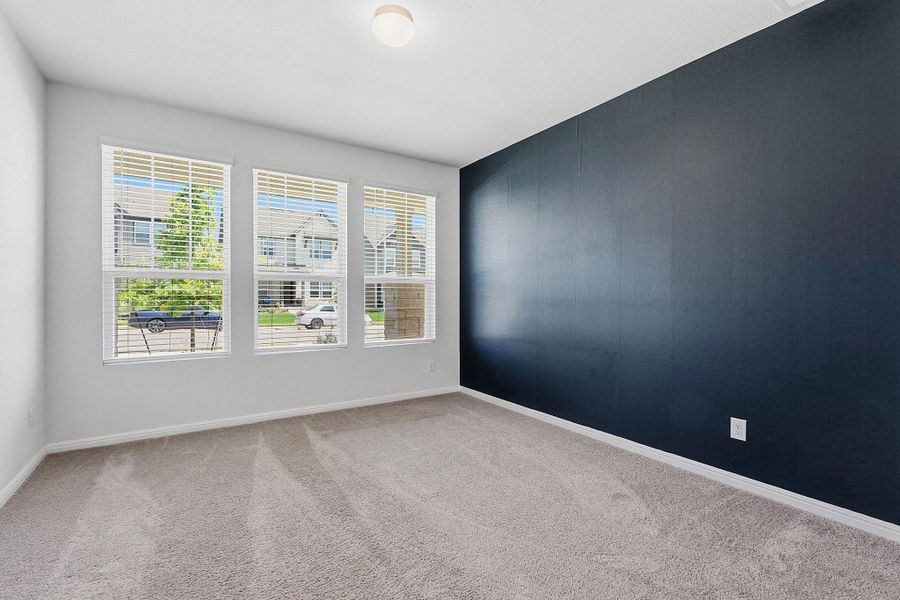 A versatile room awaits your personal touch with soft carpeting and ample natural light. A versatile room awaits your personal touch with soft carpeting and ample natural light.