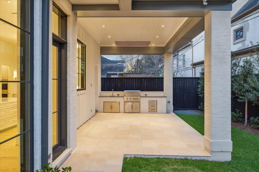 [Loggia / Summer Kitchen]The summer kitchen has a Coyote grill and sink.