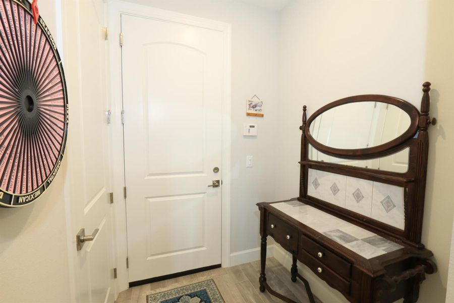 Furnished interior view inside a new home in Del Webb Tradition, Port St. Lucie (Image 10).