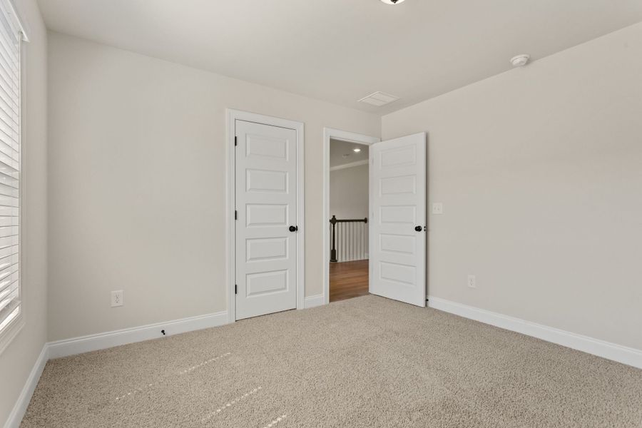 Spacious, unfurnished interior of a new home in Cherokee Knoll, Williamston (Image 23).