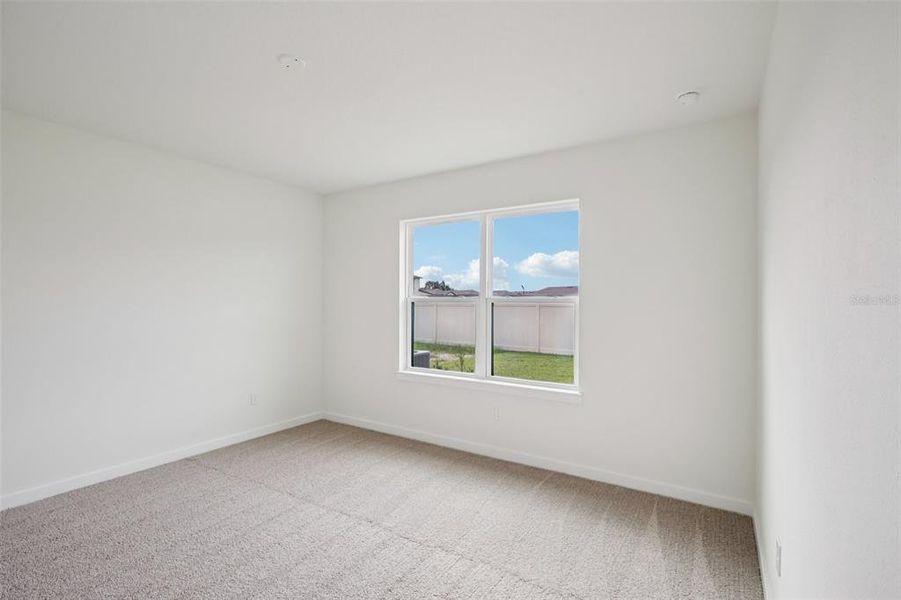 Spacious, unfurnished interior of a new home in Grasslands West, Lakeland (Image 20).