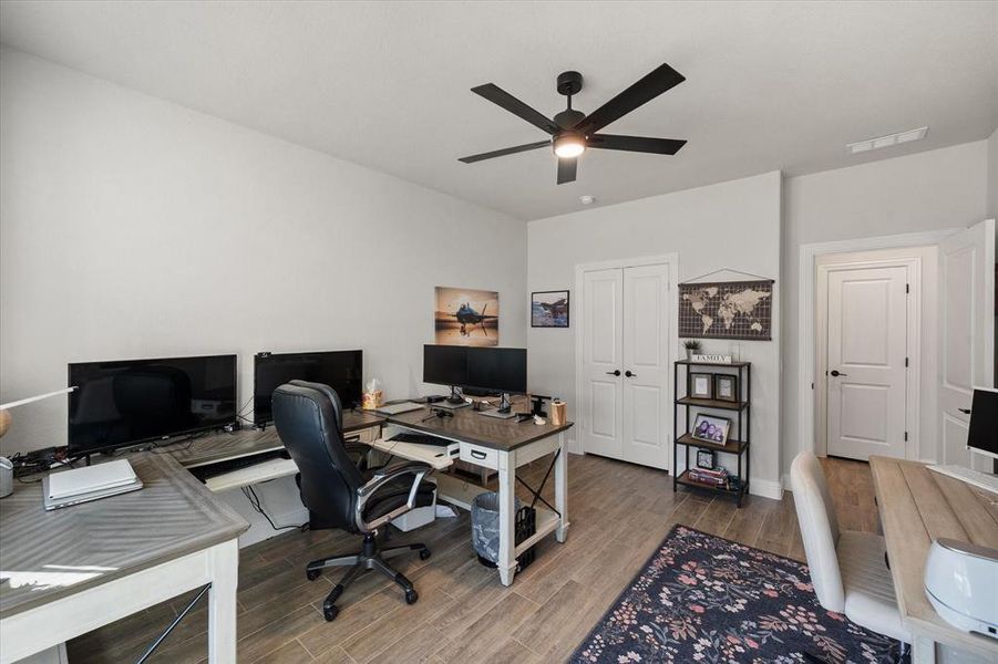 Office featuring wood finished floors and a ceiling fan