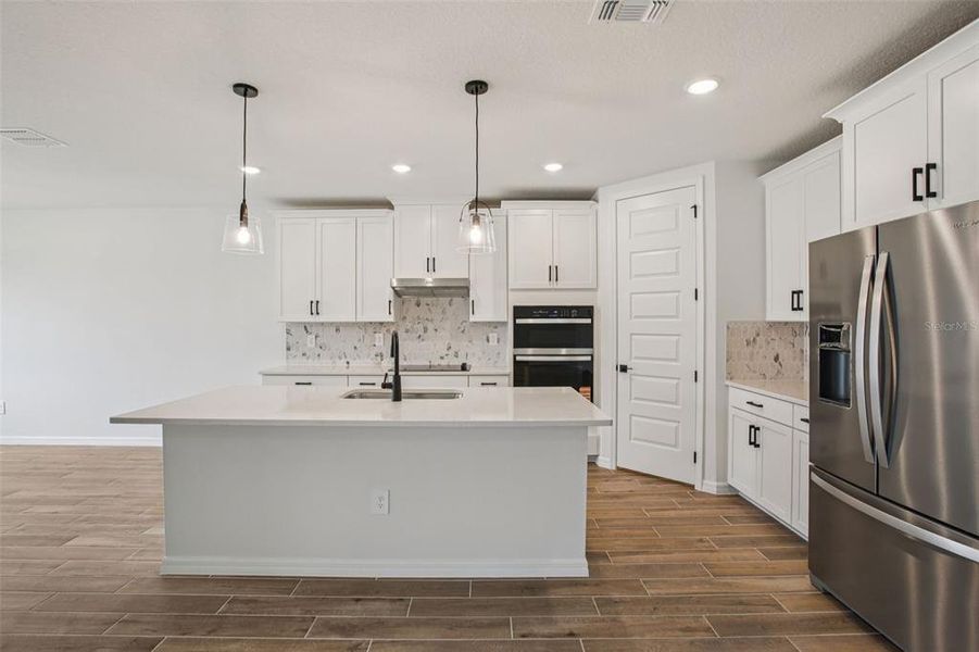 Furnished interior view inside a new home in Two Rivers - Signature Series, Zephyrhills (Image 7).