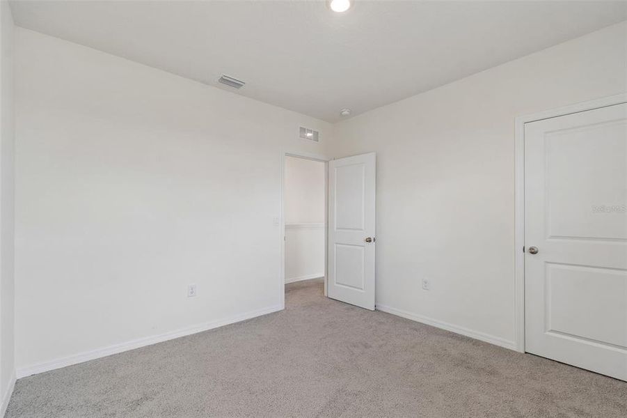 Spacious, unfurnished interior of a new home in Epperson, Wesley Chapel (Image 54).