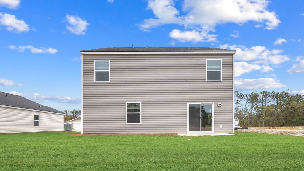 Exterior details and patio area of a home in The Groves at Bees Creek, Ridgeland (Image 3).