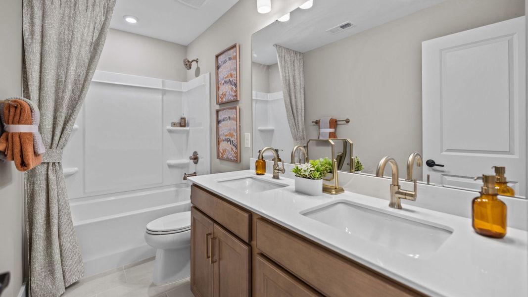 The Stonefield Home Plan in Michaux Garden by DRB Homes in Belmont, NC. - Bathroom