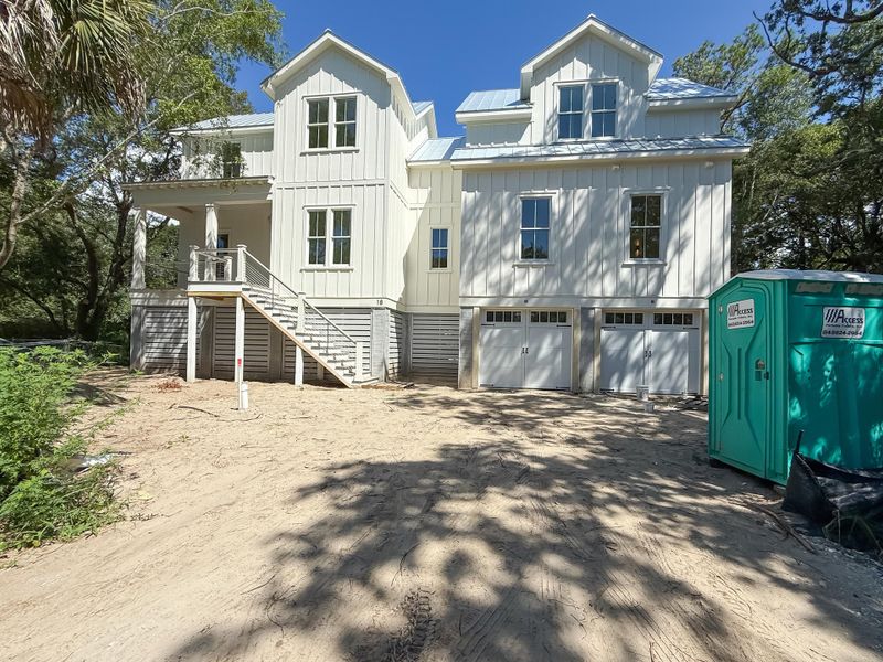 Front exterior of a new home in , Isle Of Palms, SC, highlighting curb appeal (Image 33). Front exterior of a new home in , Isle Of Palms, SC, highlighting curb appeal (Image 33).