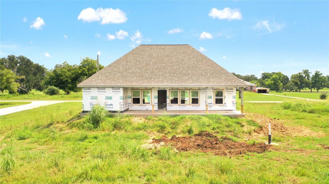 Front exterior of a new home in , Angleton, TX, highlighting curb appeal (Image 10). Front exterior of a new home in , Angleton, TX, highlighting curb appeal (Image 10).