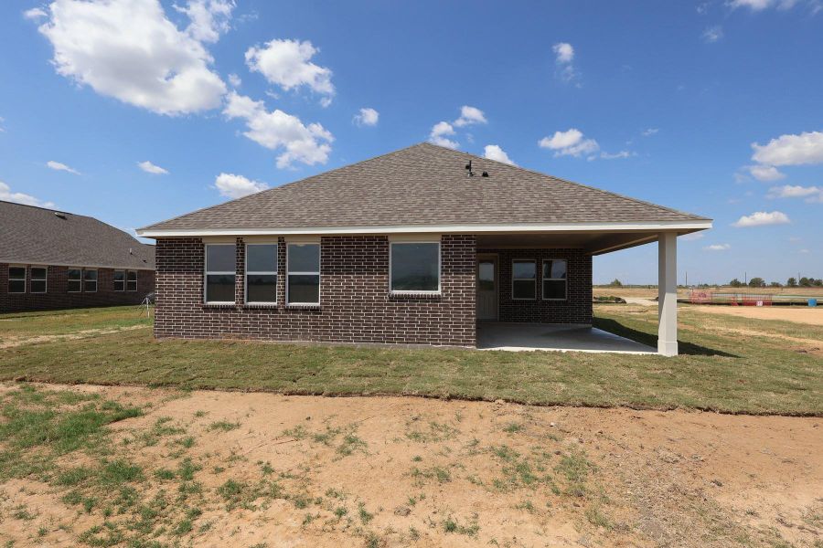 Covered patio in backyard Covered patio in backyard