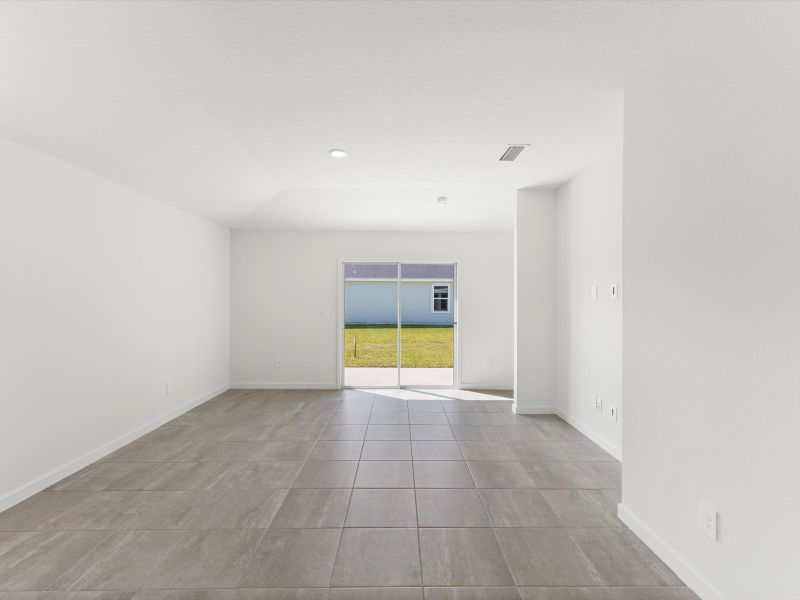 Spacious, unfurnished interior of a new home in Flagler Village - Classic Series, Palm Coast (Image 9). Spacious, unfurnished interior of a new home in Flagler Village - Classic Series, Palm Coast (Image 9).