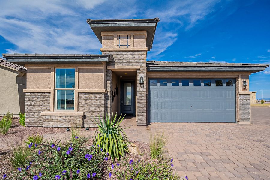 Representative exterior photo of a completed home built from the Castillo Series - Bluebell by Brightland Homes in Castillo at Anderson Parc, Buckeye, AZ (Image 27).