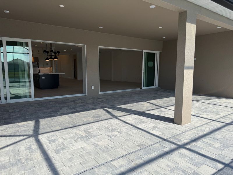 Exterior details and patio area of a home in Esplanade Lake Club, Fort Myers (Image 3).